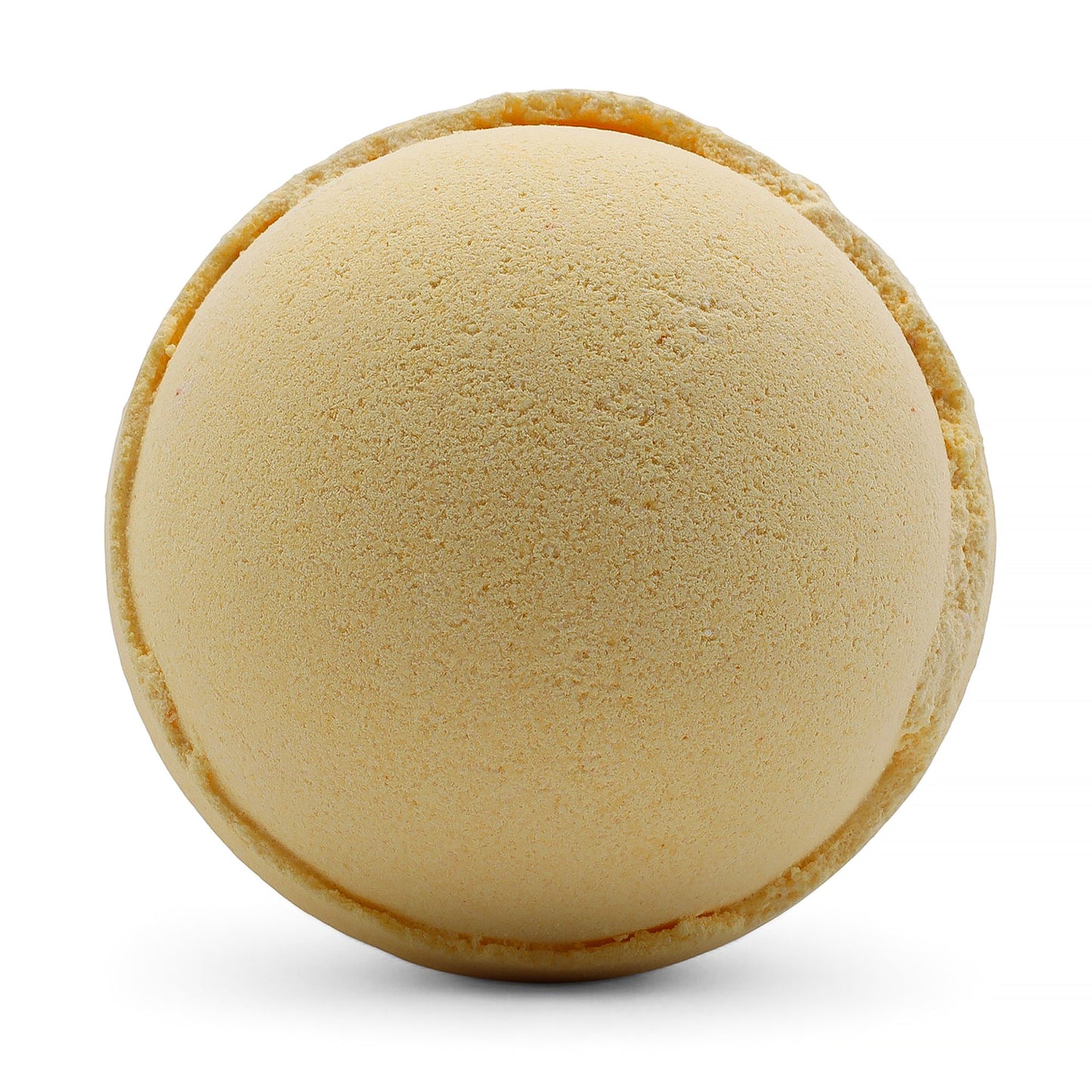 Yellow bath bomb on a white background