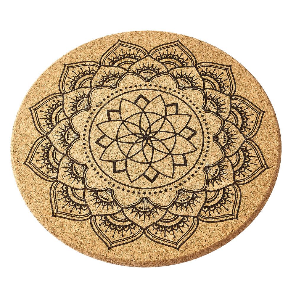 Round cork crystal grid with black mandala design on a white background