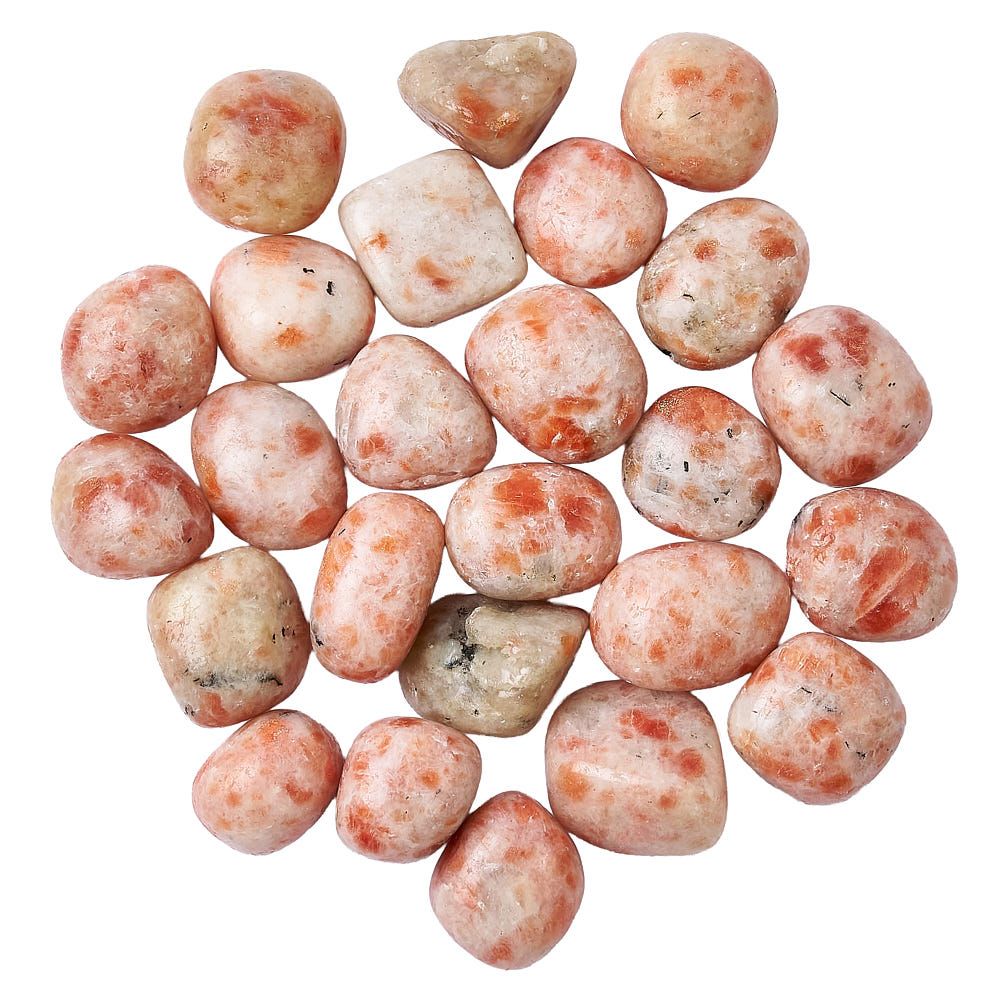 Collection of sunstone tumble stones on a white background