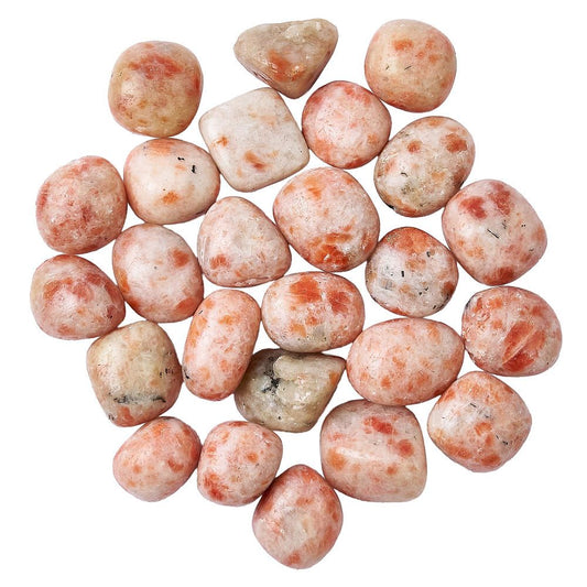 Collection of sunstone tumble stones on a white background