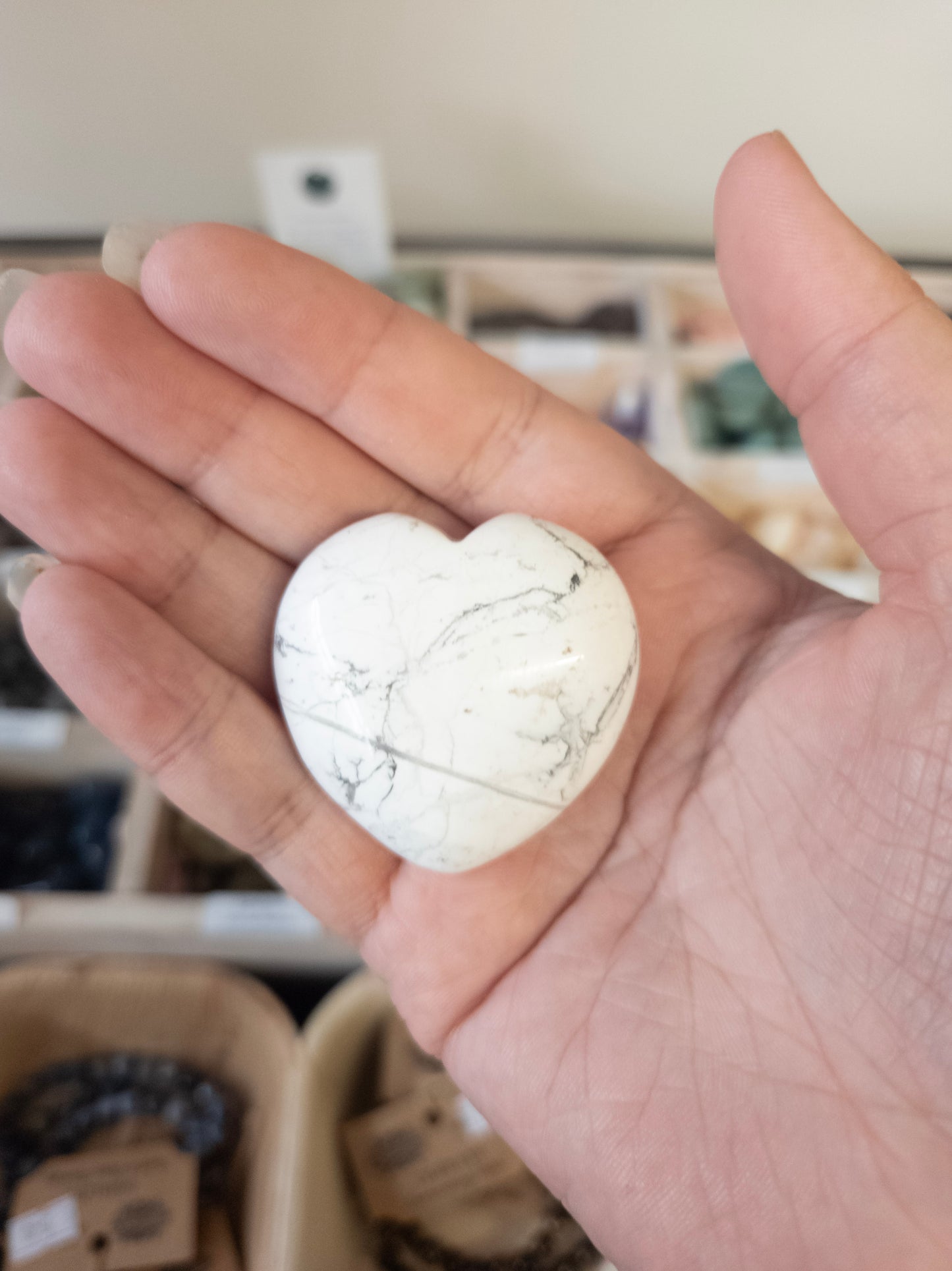 Heart-shaped stone held in a hand