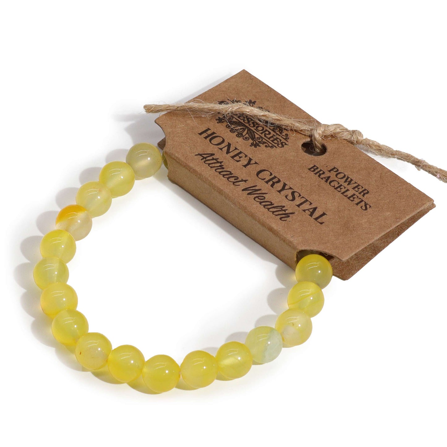 Honey crystal bracelet with a tag on a white background